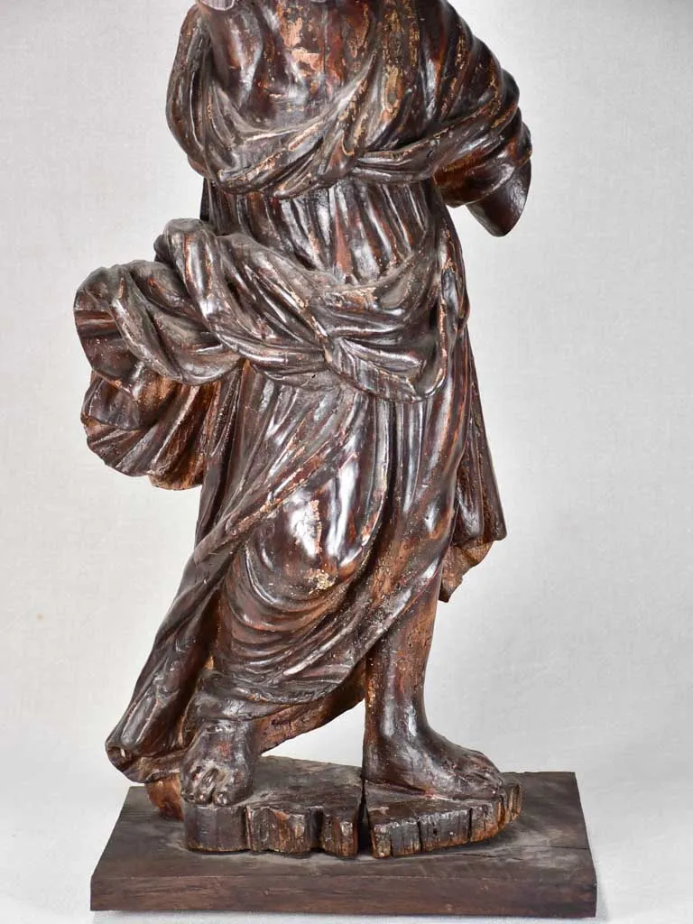 17th-century wooden sculpture of an angel 30"