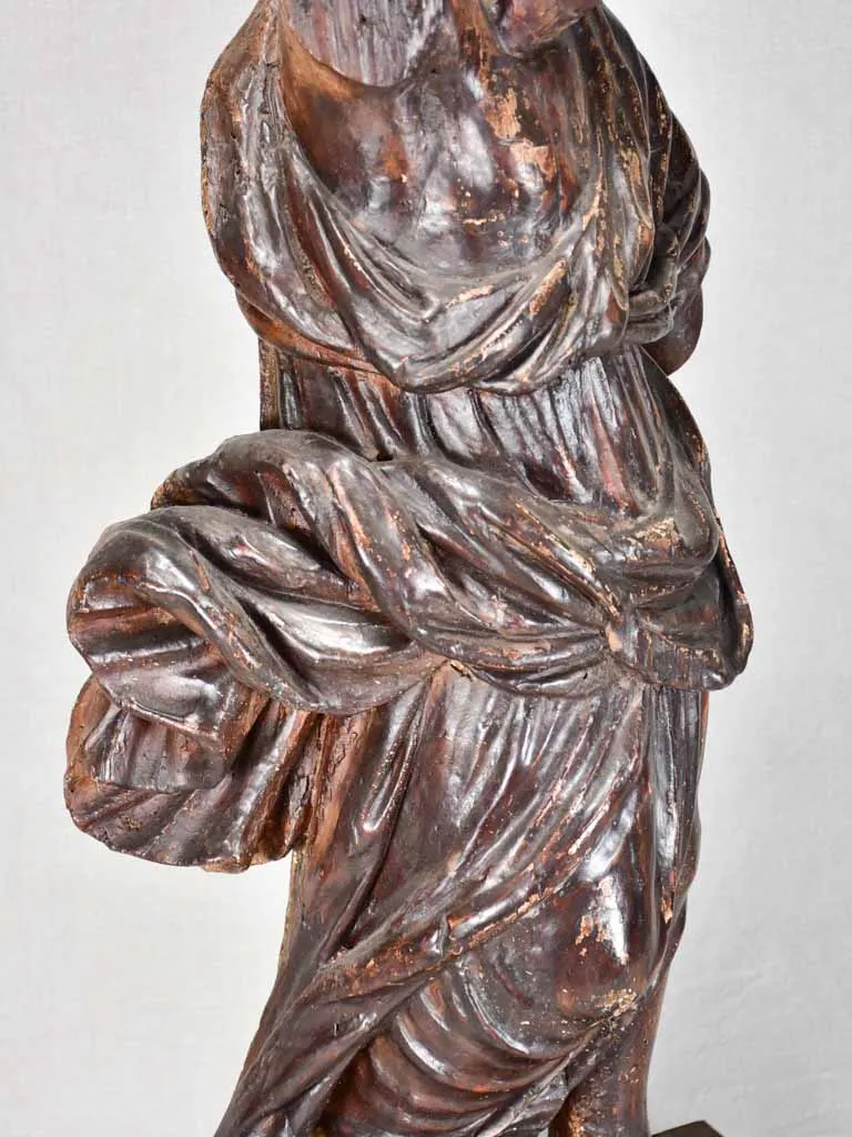 17th-century wooden sculpture of an angel 30"