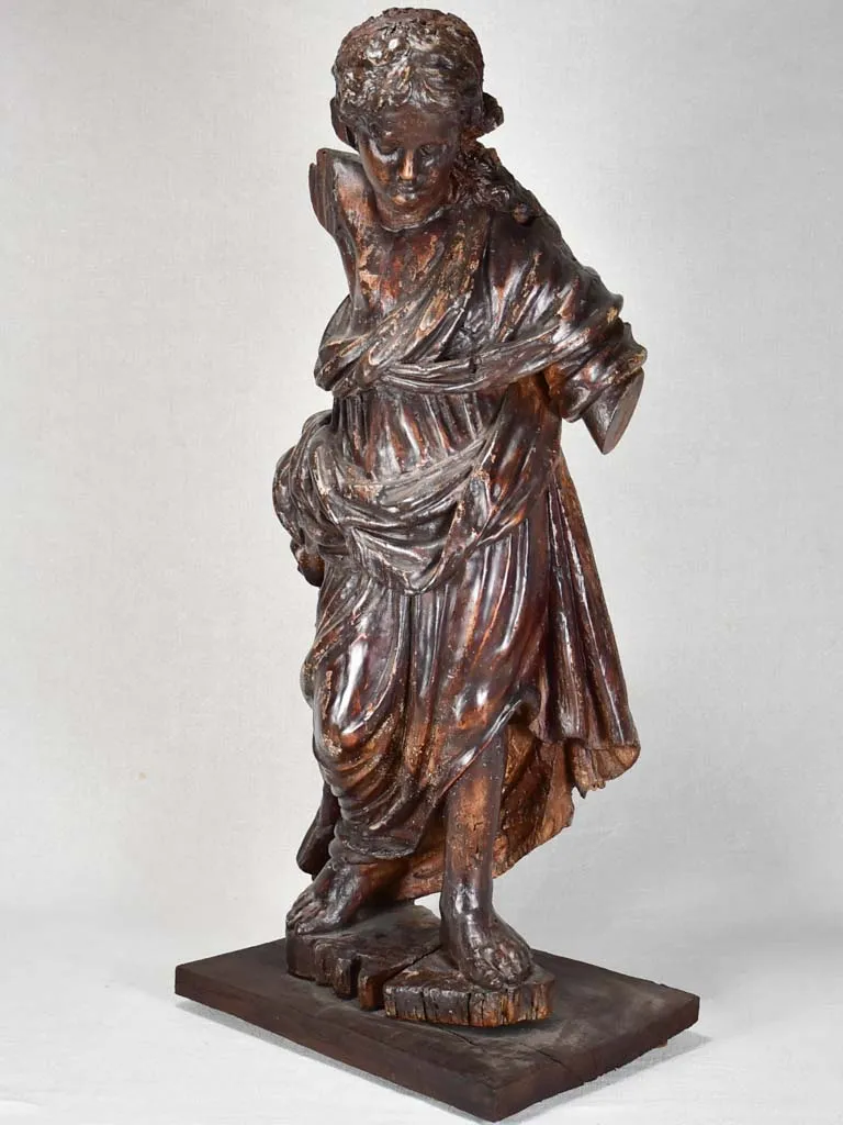 17th-century wooden sculpture of an angel 30"