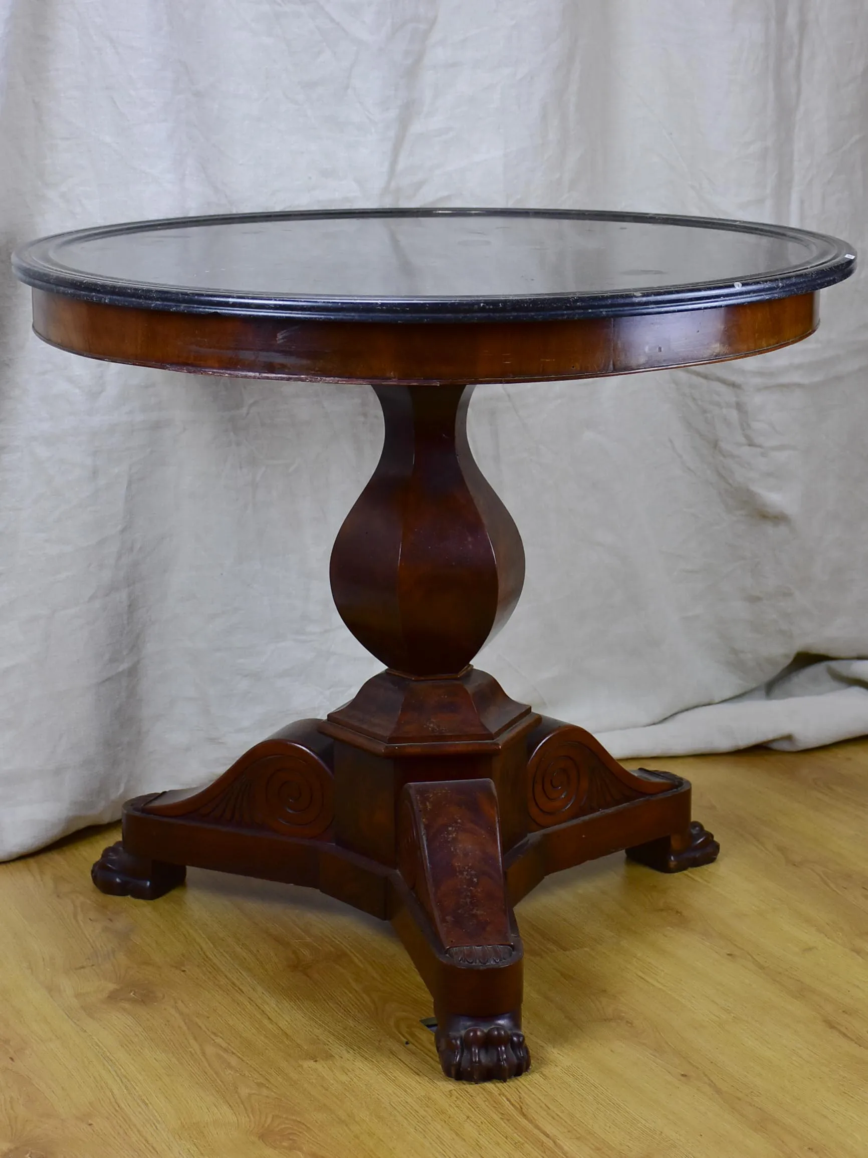 19th Century black marble top entry table with claw feet