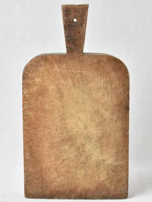 Antique French cutting board with rounded shoulders 17" x 9"