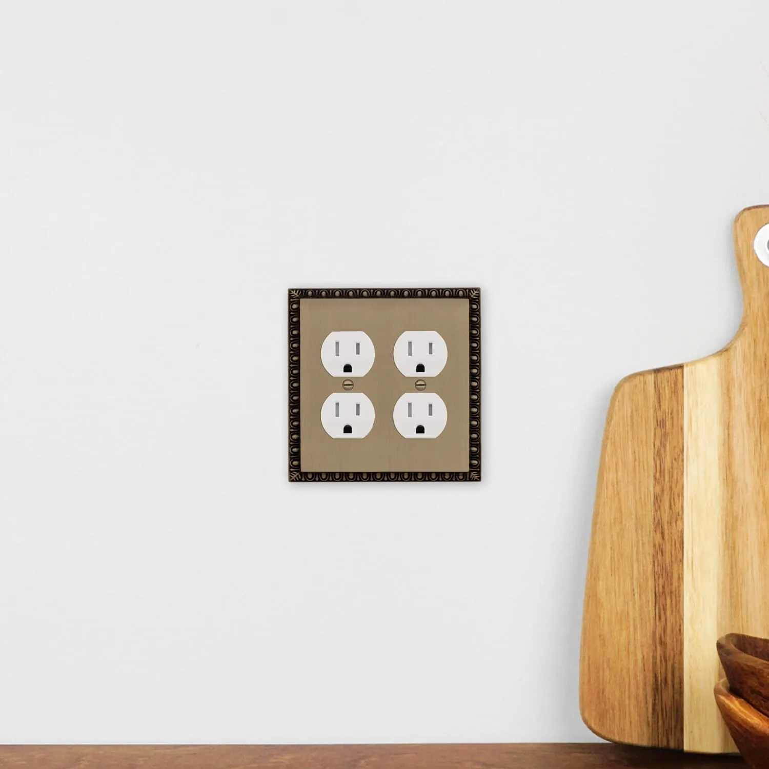 Egg & Dart Switch Plate with Double Outlet in Antique Brass