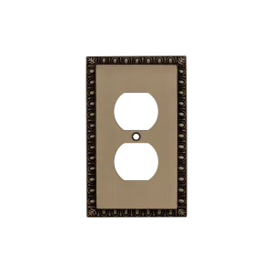 Egg & Dart Switch Plate with Outlet in Antique Brass